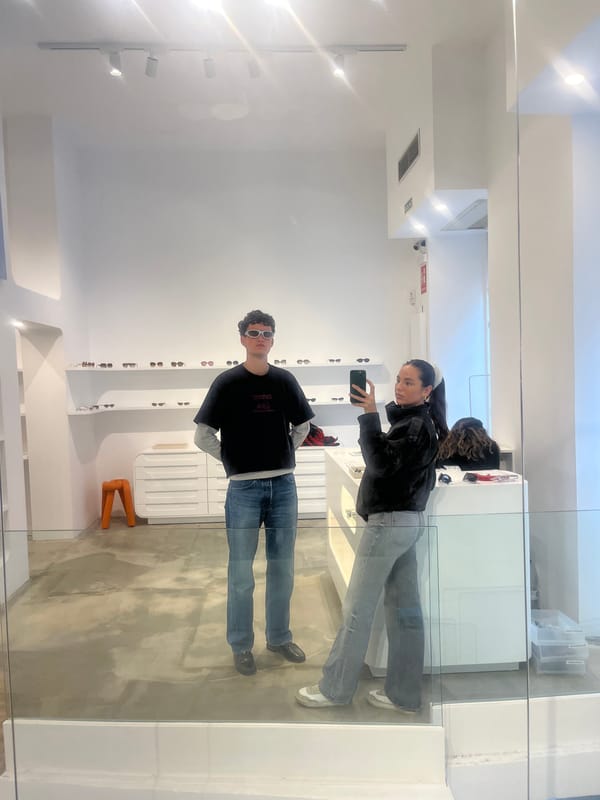 Couple shops for eyewear in Madrid store