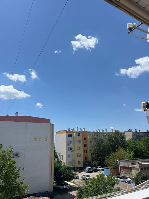 Mixed urban scenes: buildings, guitars, strawberries captured independently