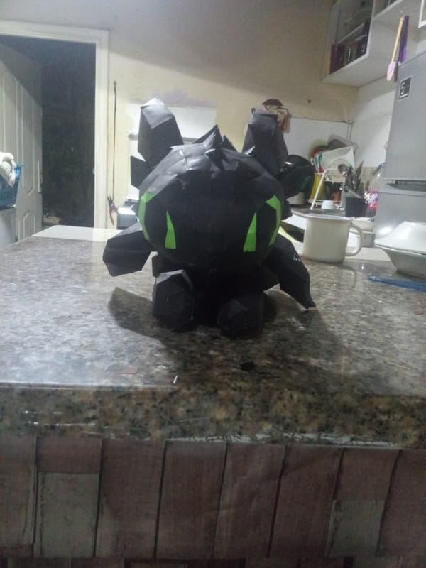 Papercraft figures displayed on Venezuelan kitchen counter
