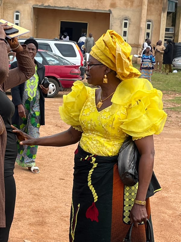Community gathering outside a church in Jos, Nigeria