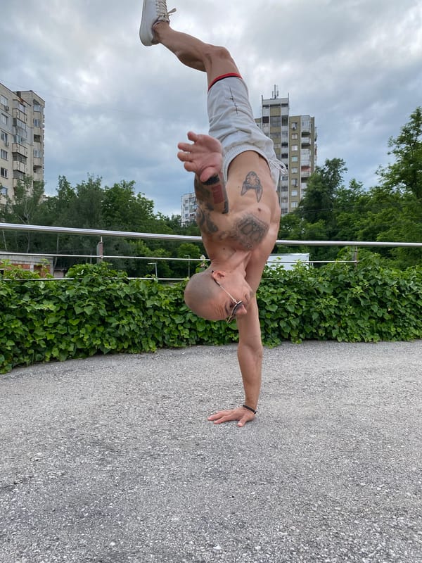 Man performs calisthenics workout outdoors in Pleven Bulgaria