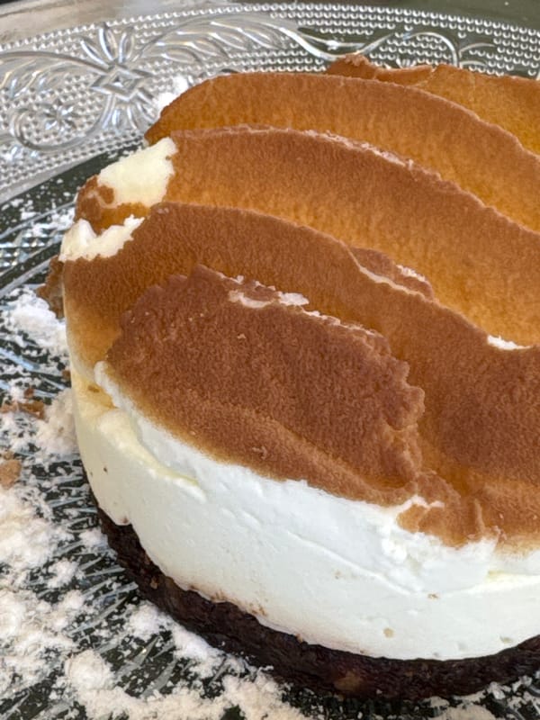 Woman enjoys dessert at Ramat Gan cafe