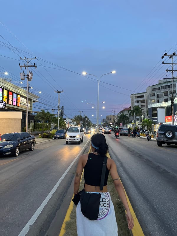 Street scenes captured near colorful mural in Pampatar, Venezuela