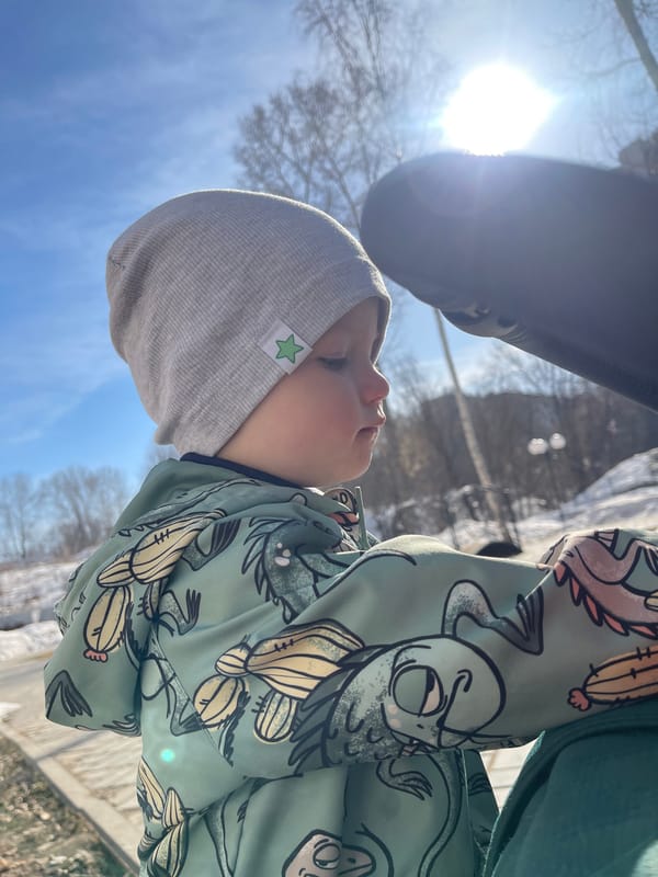 Child enjoys early spring morning in Izhevsk park