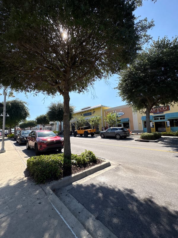 Evening street life documented in Panama City Beach commercial district