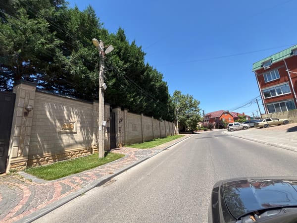 Driving through a quiet residential street in Krasnodar