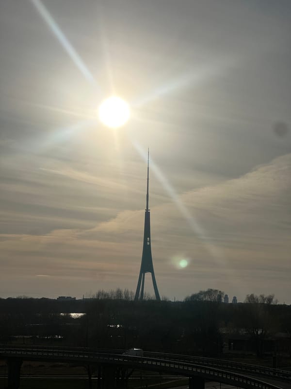 Riga TV Tower viewed from multiple locations during afternoon
