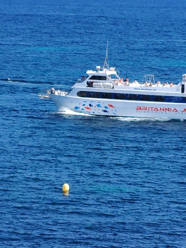 Boats and beaches on a busy Magaluf afternoon