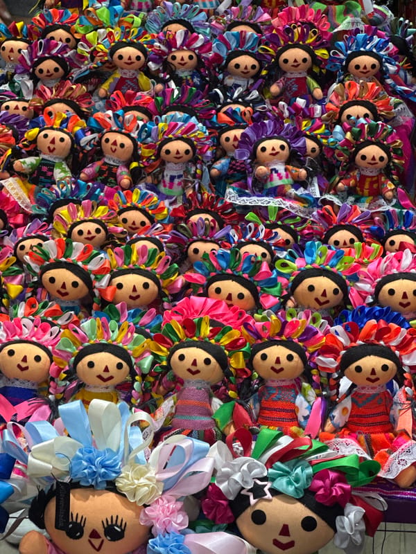 Handmade Mexican rag dolls displayed at Mexico City market