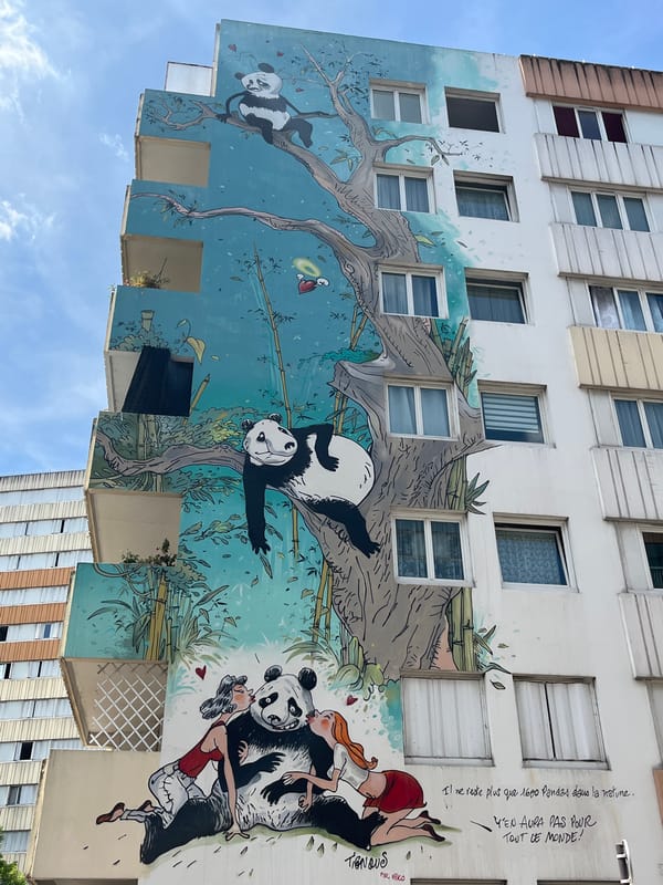 Paris street murals and everyday scenes on a sunny July morning