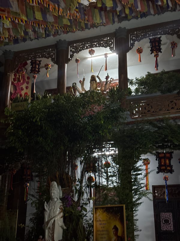 Buddhist temple with prayer flags documented in Đà Nẵng
