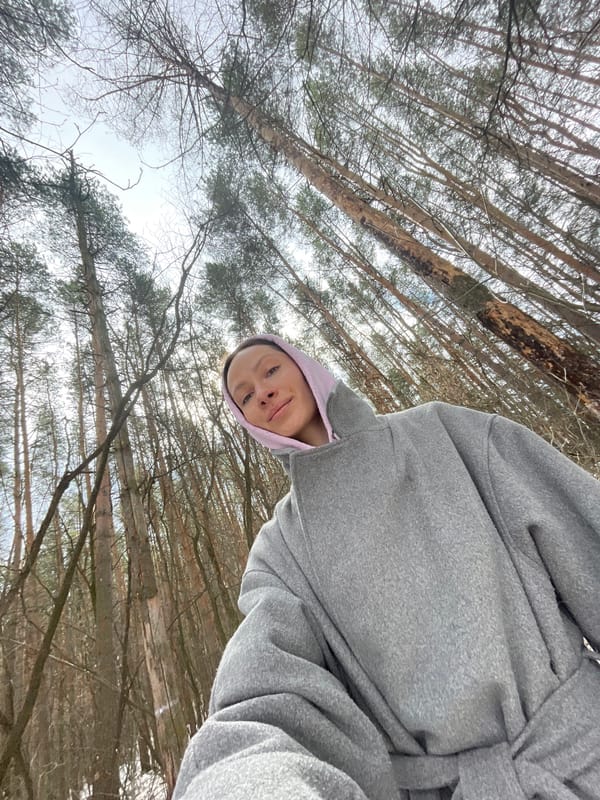 Woman takes selfie in forest near Izhevsk, Russia