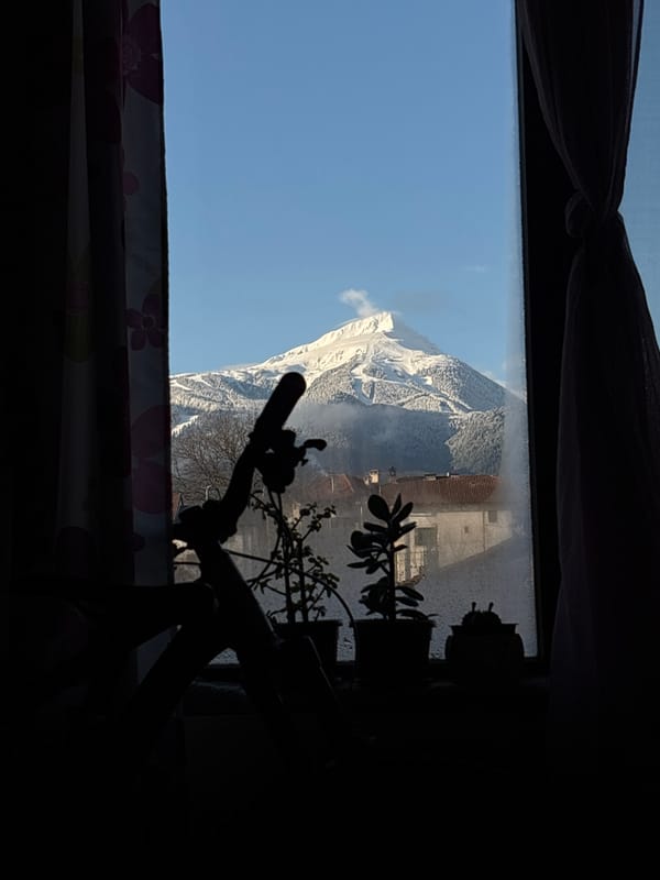 Morning mountain views captured from windows in Bansko, Bulgaria