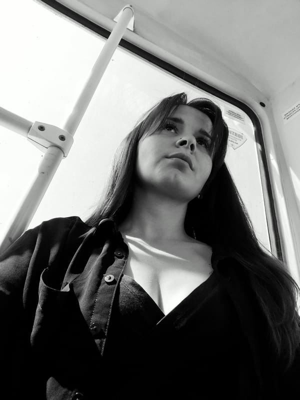 Woman photographed looking upward in Rusalevka, Russia