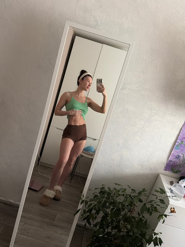 Woman takes early morning mirror selfie in Perm
