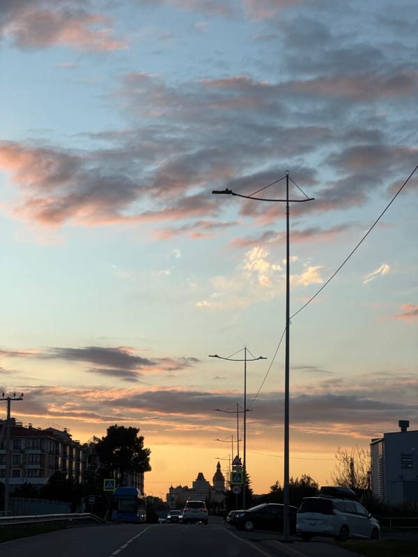 Twilight captures colorful sky over Sirius, Russia street scene