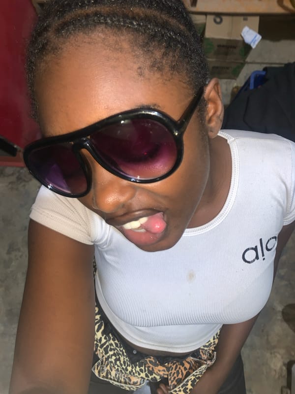 Couple takes selfies indoors at New Stadium Nigeria