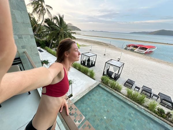 Beachfront balcony and flower petal bath setup in Ko Samui