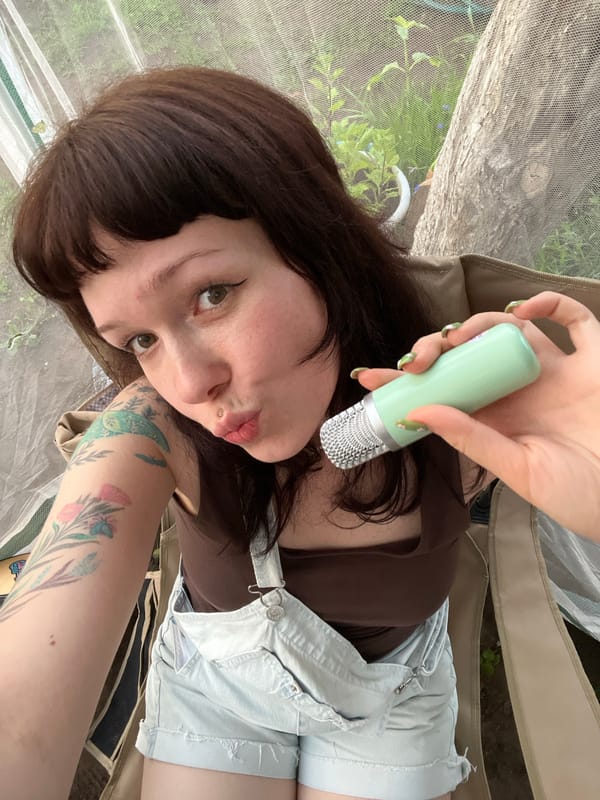 Mic in hand and a dog's teeth: casual indoor moments in Chaikovsky