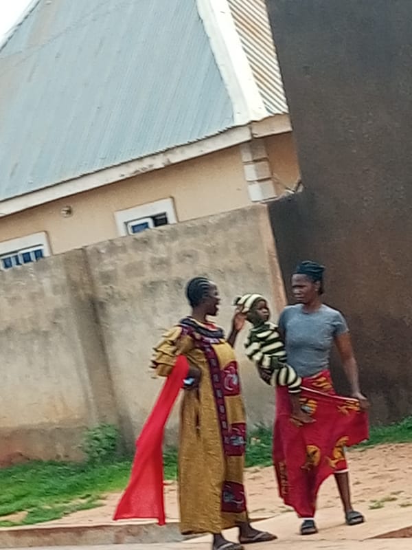 Everyday gathering in a Tempure, Nigeria courtyard