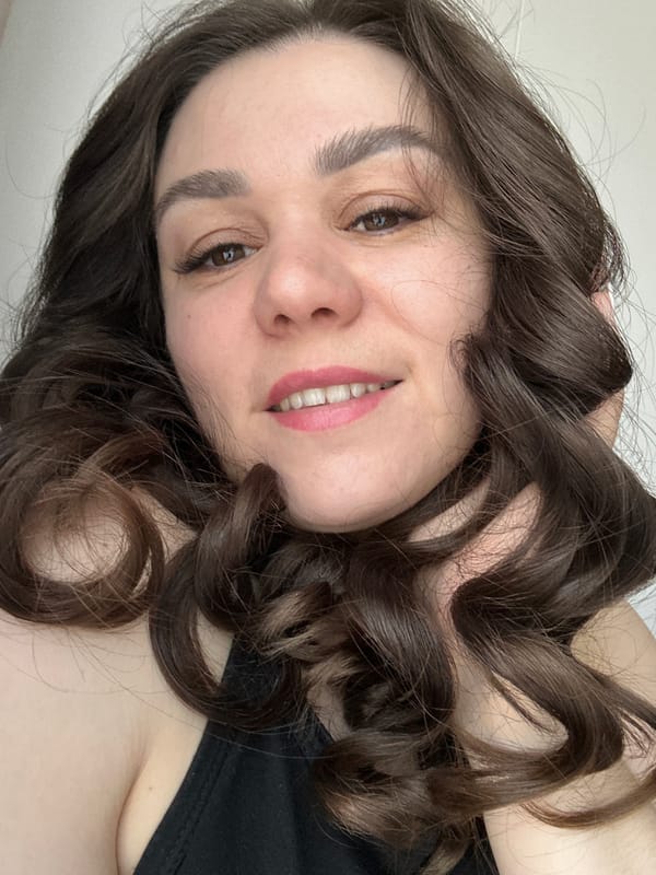 Woman photographed in various indoor poses in Chaikovsky
