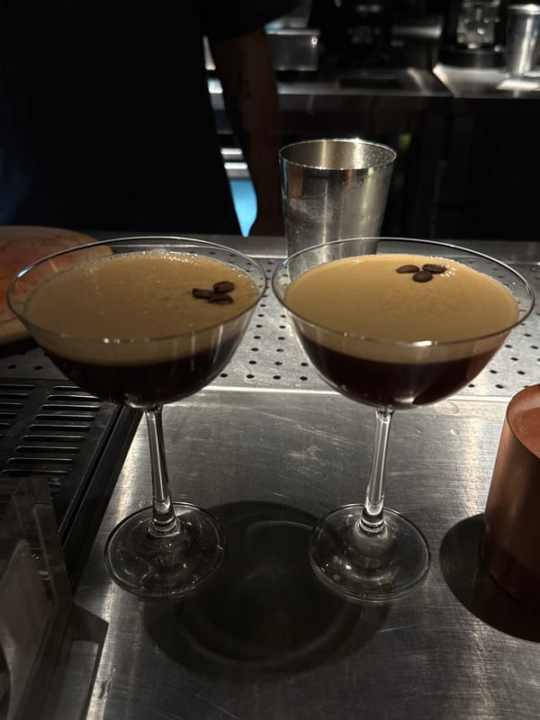 Cocktail preparation and dining captured at Yerevan restaurant