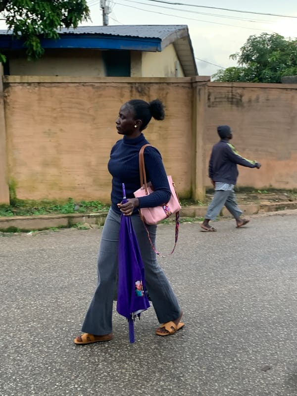 Everyday street life moving through Jos, Nigeria