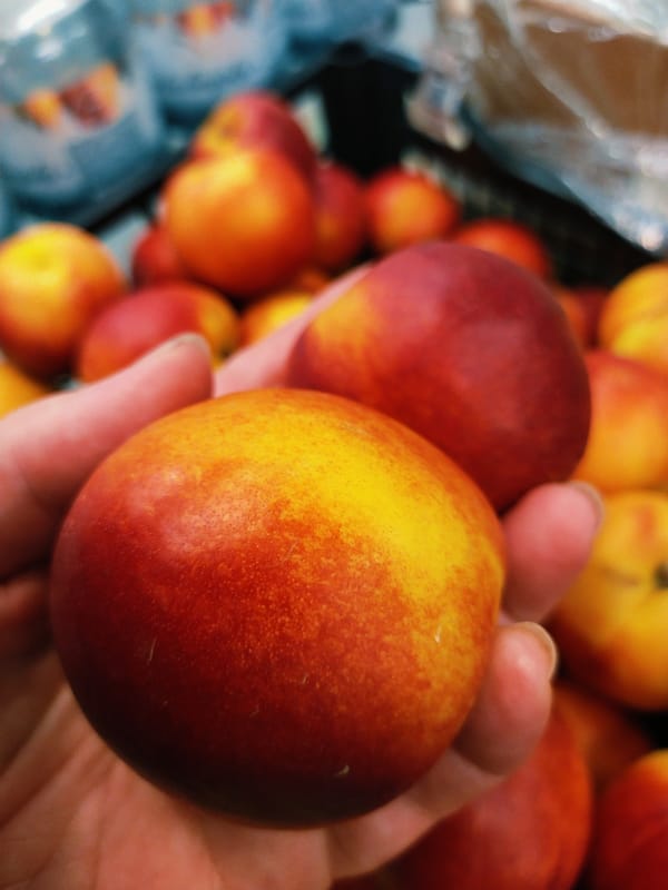 Shopping for fresh produce and snacks in Horishni Plavni