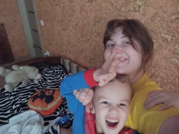 Child's playful morning moments captured in Ilskiy, Russia