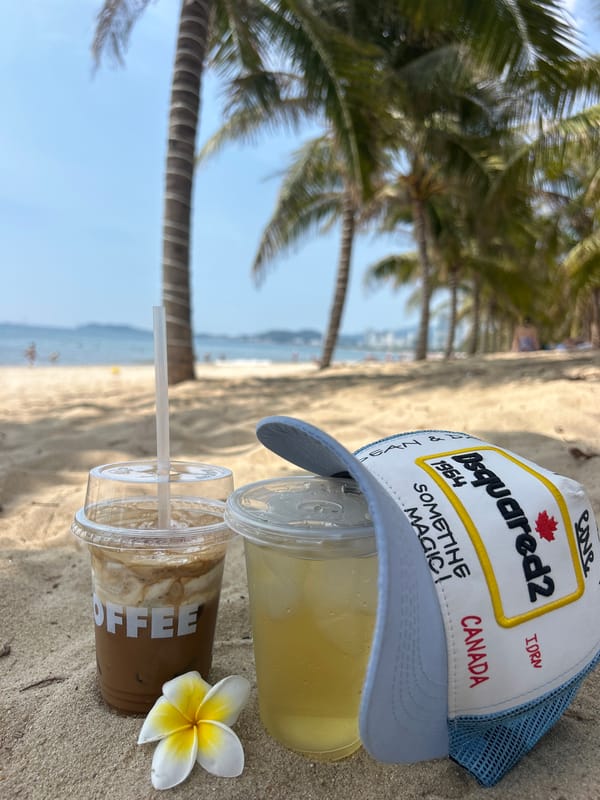 Beach visitor enjoys drinks and flowers in Nha Trang