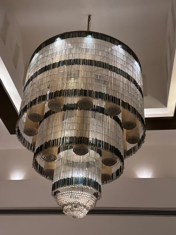 Inside the Kanpur Club: chandeliers, dining room, and a food festival