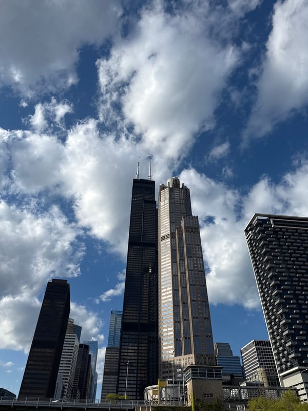 Tourist documents downtown Chicago architecture and river views
