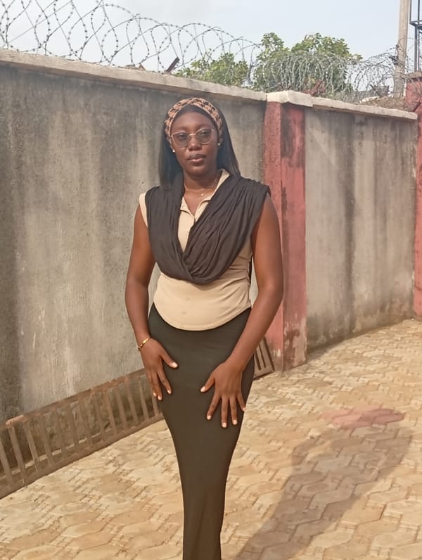 Woman in professional attire observed in Rido, Nigeria