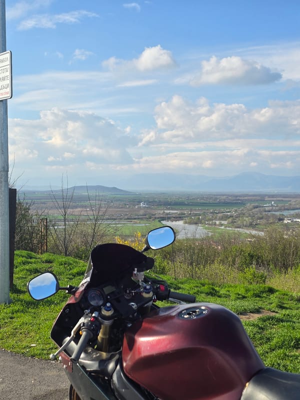 Motorcyclist documents Bulgarian flags, scenic views at Yambol memorial overlook