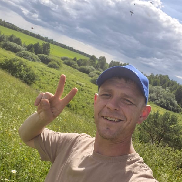 Smiling selfie with a peace sign in rural Karsha, Russia