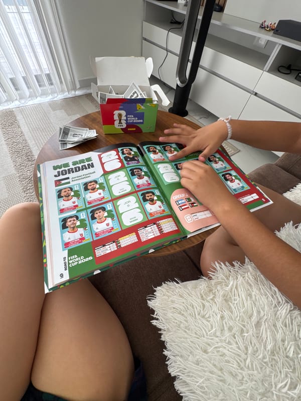 Puebla resident enjoys World Cup stickers and taco dinner