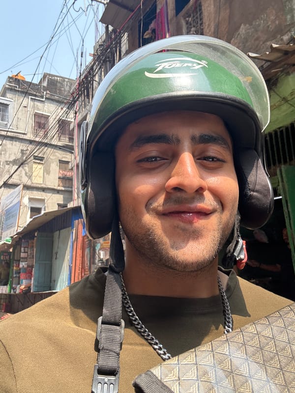 Street scenes captured in Kolkata showing motorcyclist and pedestrians