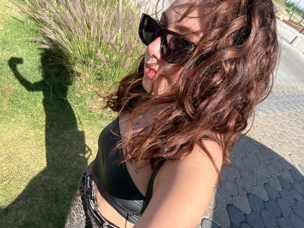 Woman in leopard print lies on ground in Mexico