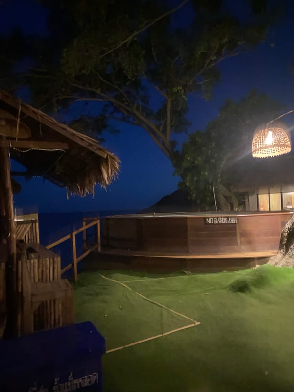 Nighttime scenes captured at outdoor venue in Ban Tai, Thailand