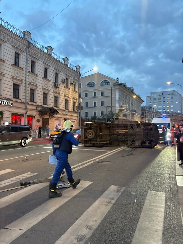 Overturned van blocks Moscow street as emergency crews respond