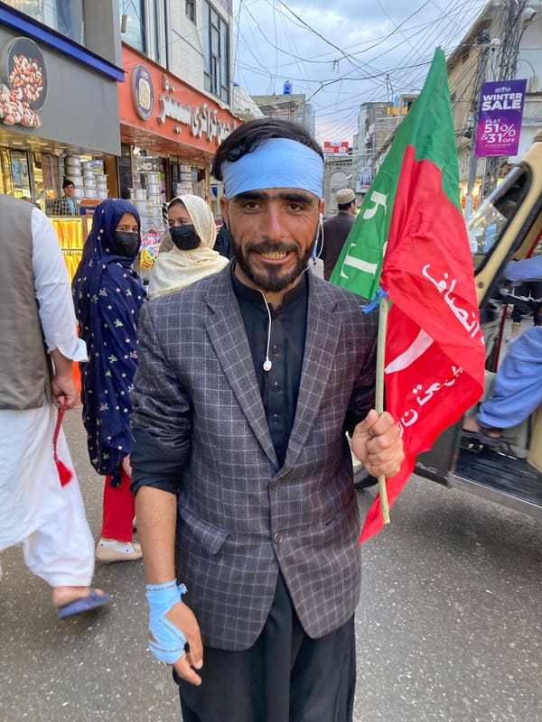 Street scenes captured across Quetta showing rest, flags, construction