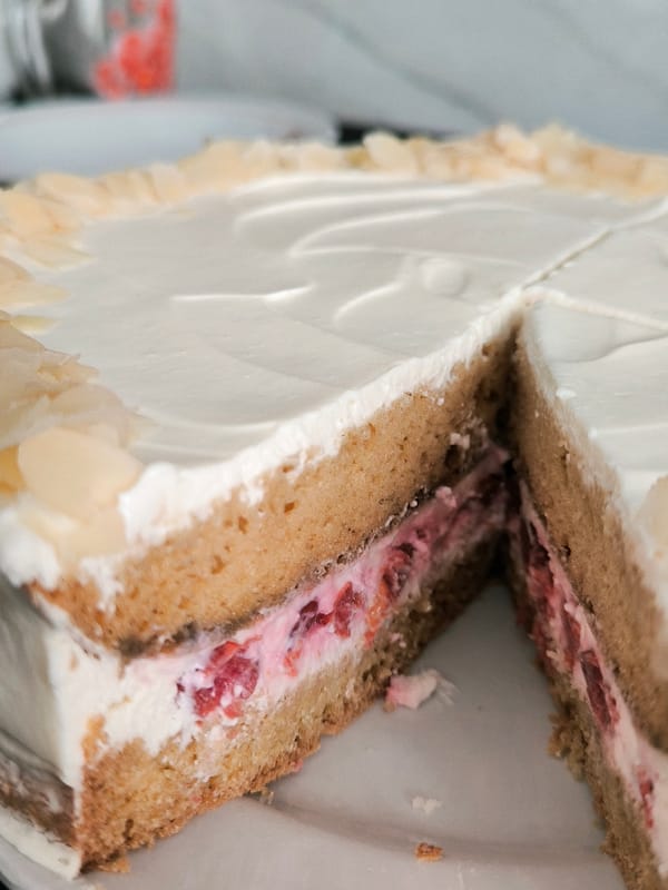 Woman documents afternoon at home with selfies and cake