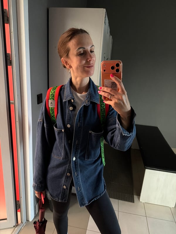 Mirror selfie in a Birobidzhan locker room, July 2026