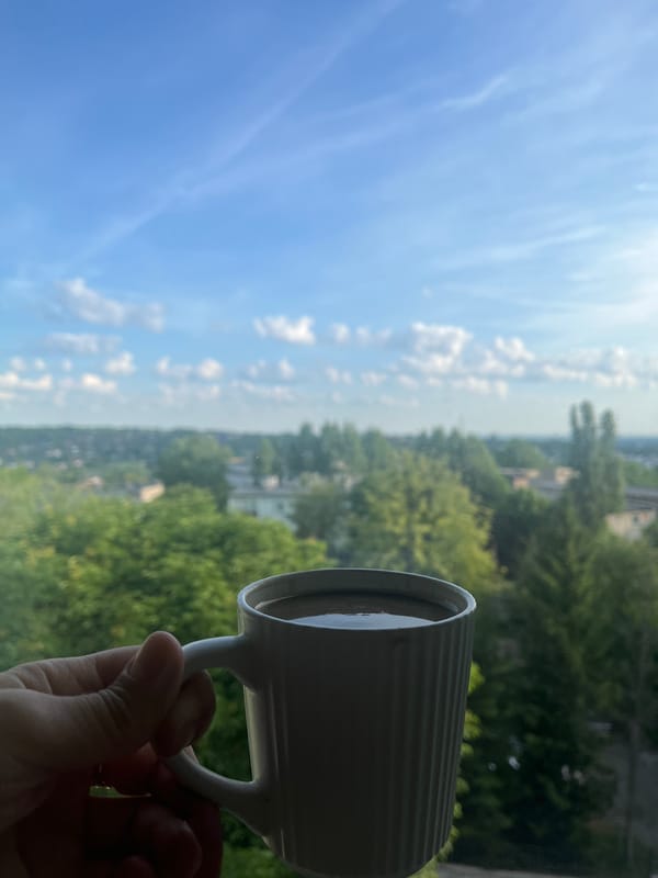 Morning coffee moment overlooking city skyline captured in 13 memories