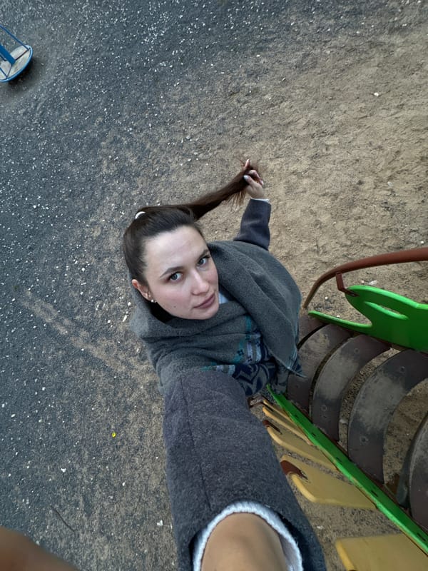 Family enjoys afternoon playground visit in suburban Odintsovo