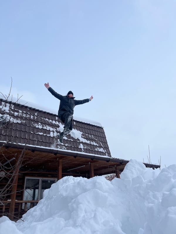 Snow play and roof clearing activities documented in Italmas, Russia