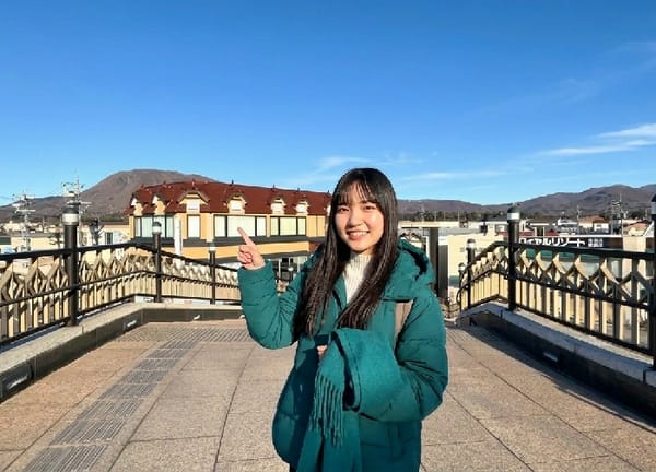 Pedestrians captured in early morning Karuizawa street scenes