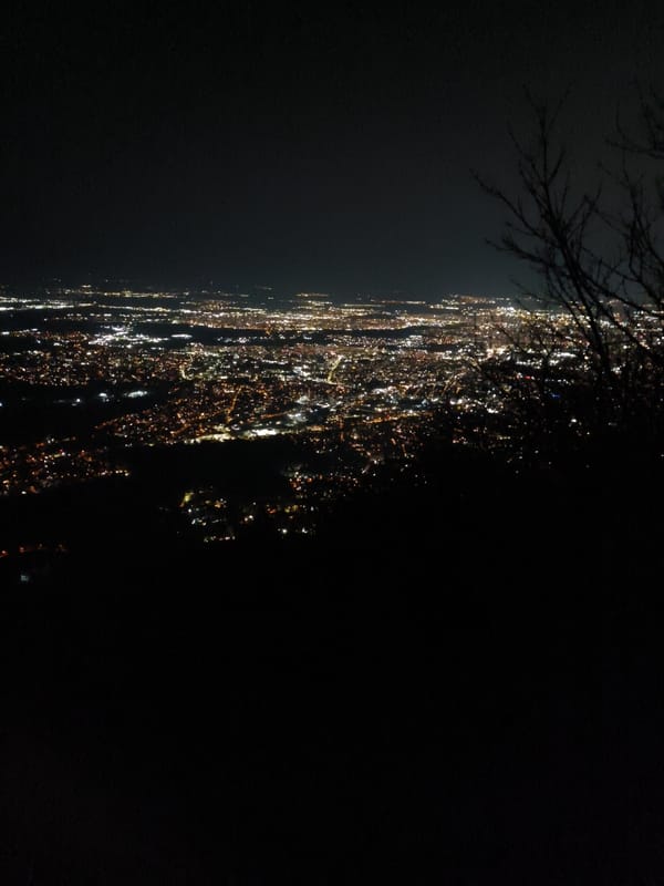 Nighttime aerial views capture illuminated Sofia cityscape