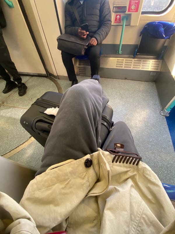 Commuter documents DLR journey across London platforms and carriages