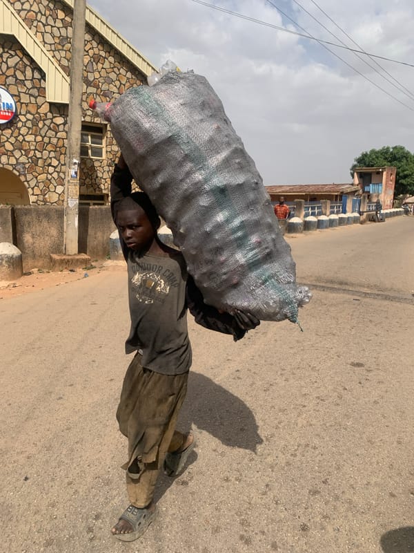 Daily street life documented across Jos, Nigeria neighborhoods